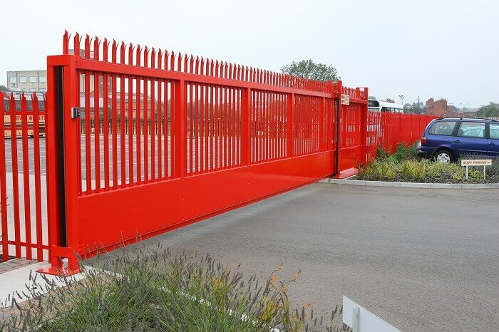 A red steel automatic sliding gate