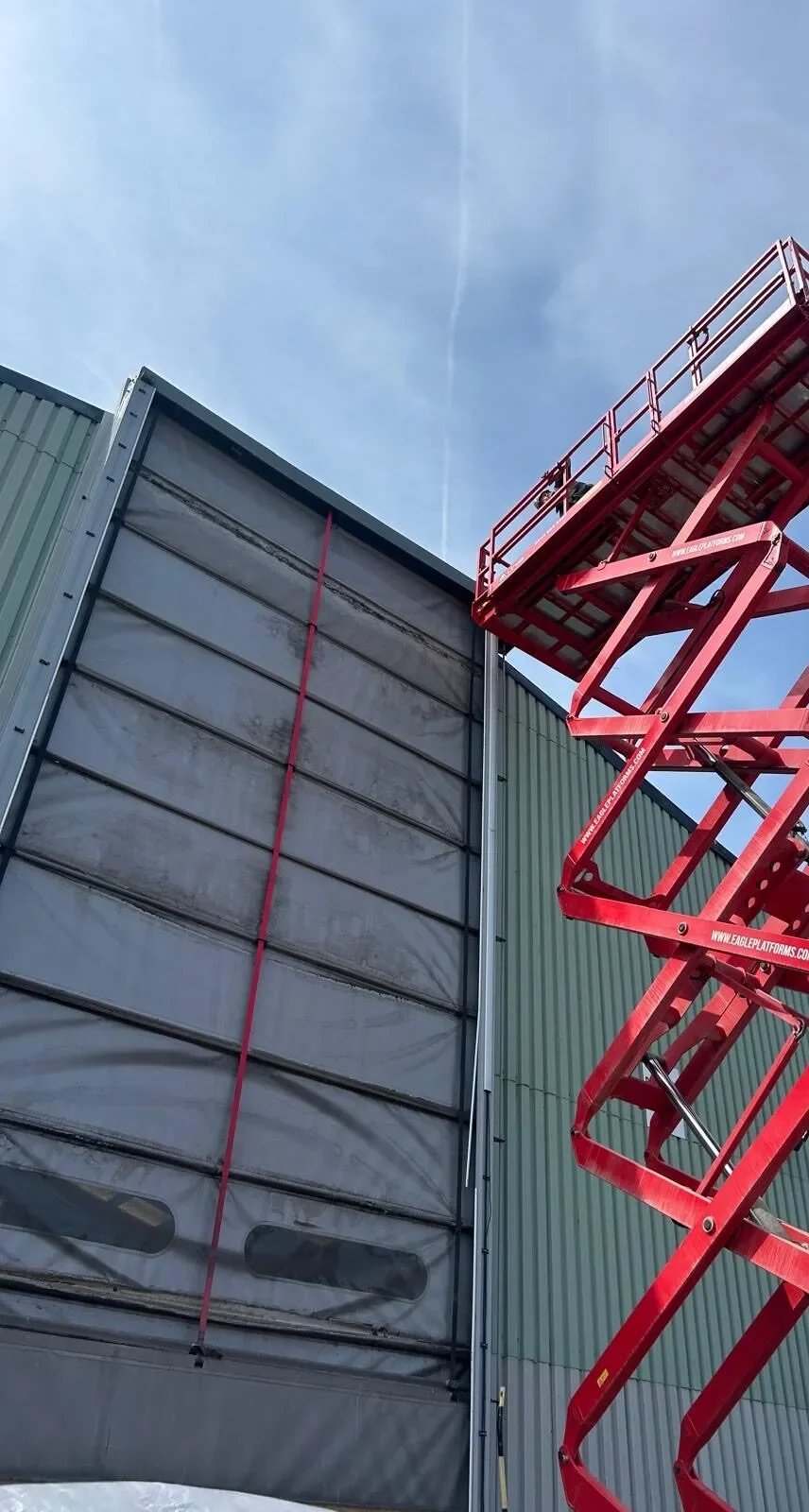 Using a Mobile Elevating Work Platform (MEWP) to inspect a shutter